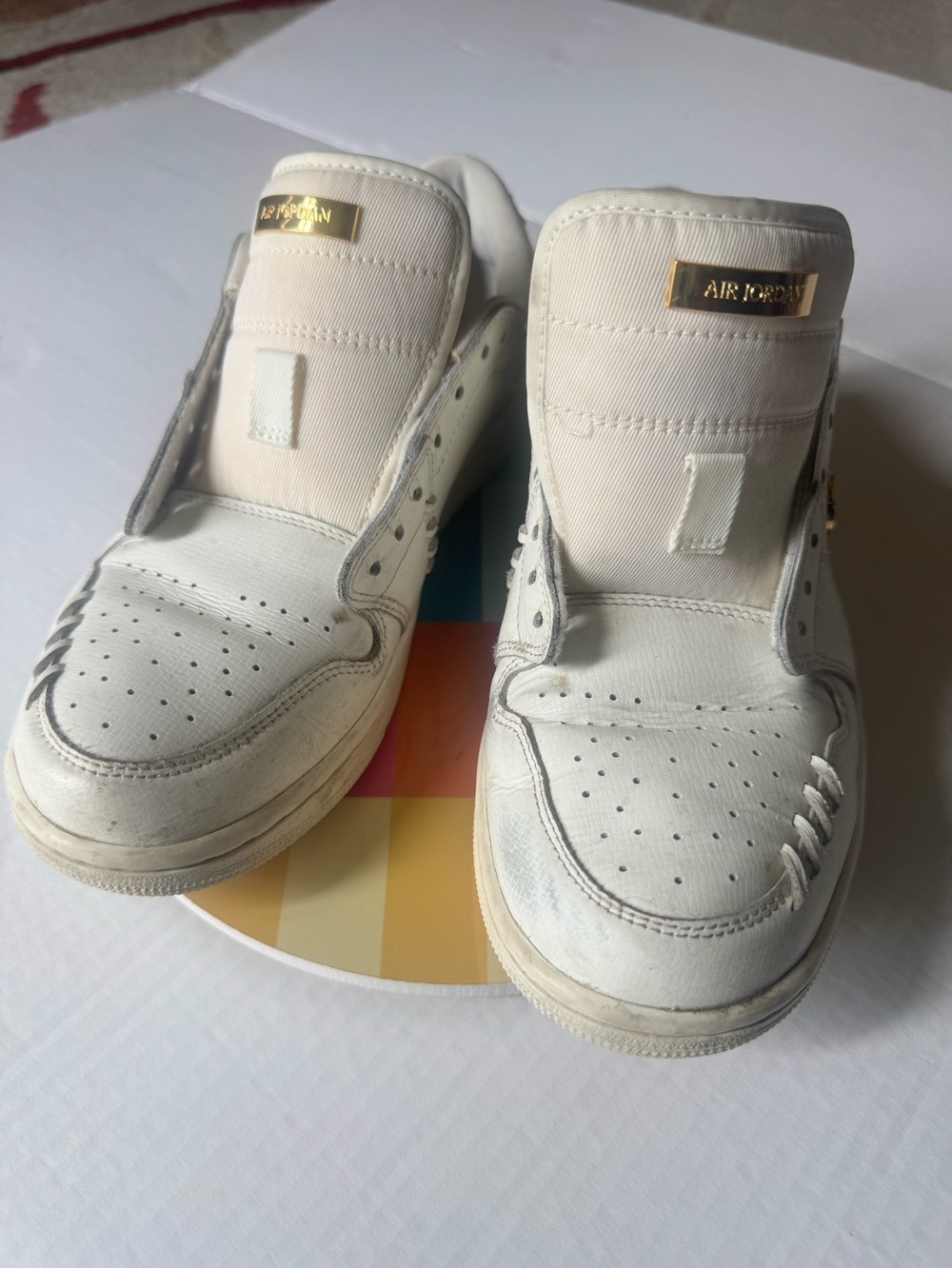 Nike White Low-Top Leather Sneakers with Gold Tongue Plate